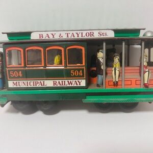 Source Unknown Bay & Taylor Sts. Toy Trolley - Green and Orange